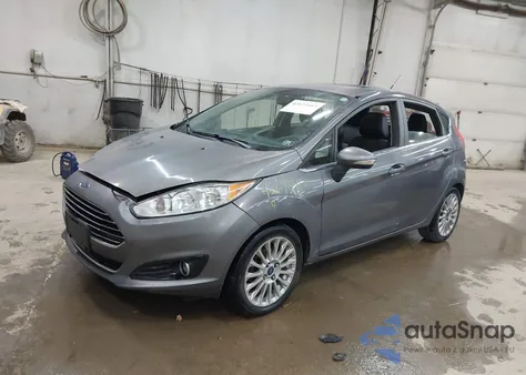 2014 Ford Fiesta Titanium из США, поврежденный, VIN 3FADP4FJ4EM220367